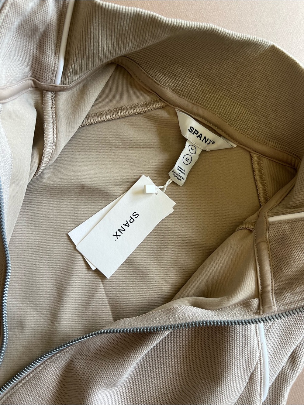 SPANX AirEssentials Pique
Sleeveless Mockneck Jumpsuit in Beige Ashwood - Picture 6 of 9